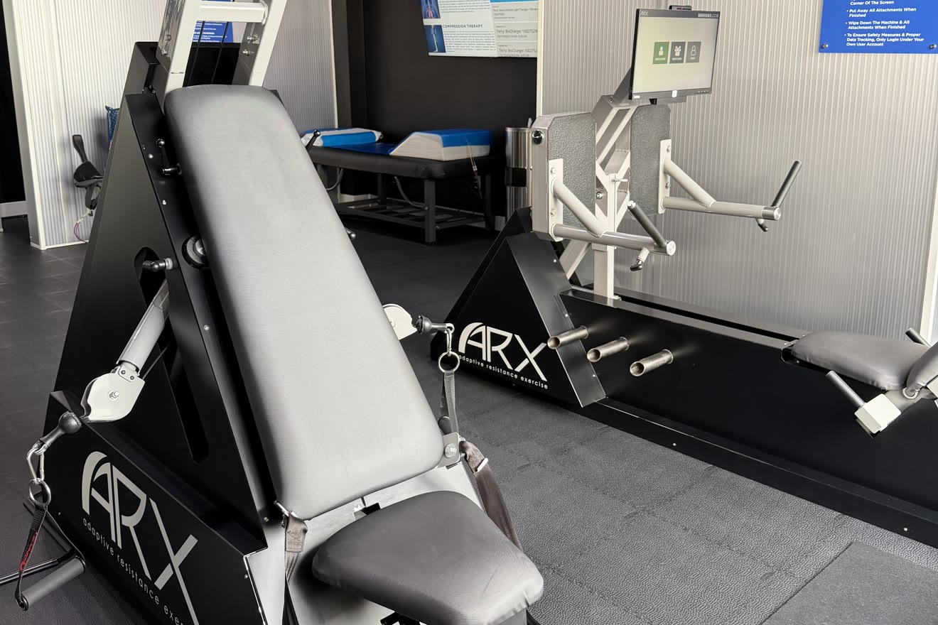 ARX adaptive resistance bench and machine on the studio floor at BioHack Studios