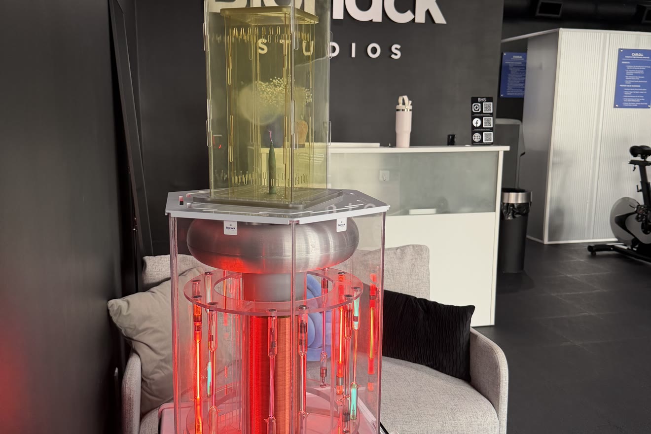 BioCharger recovery device glowing red at BioHack Studios in St. Petersburg